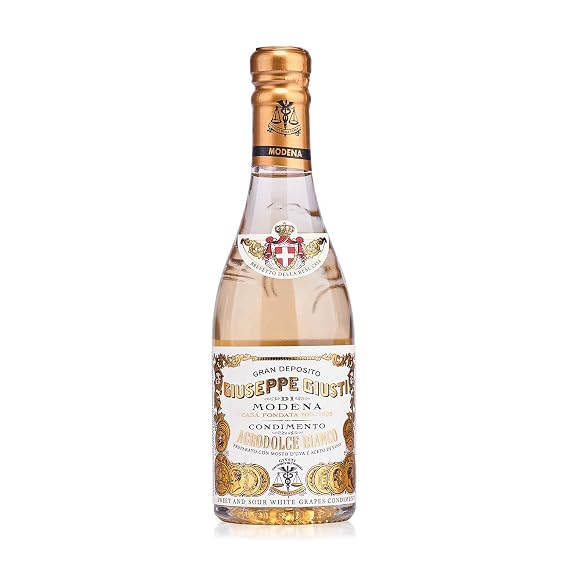 Giusti White Vinegar Dressing from Modena, Italy - 8.45 fl oz | Condiment made with grape must and white wine vinegar. Sweet citrus notes, low acidity for salads, seafood, vegetables.