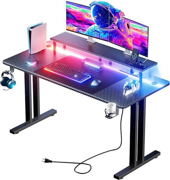 HLDIRECT 47 Inch Gaming Desk with LED Lights & Cable Management, Black | Ergonomic carbon fiber gaming computer desk with 5 sockets, monitor stand, cup holder, headphone hook & mouse pad for gamers